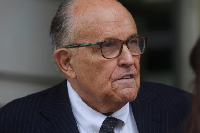 <p>FILE PHOTO: Former New York City Mayor Rudy Giuliani, an attorney for former U.S. President Donald Trump during challenges to the 2020 election results, exits U.S. District Court after attending a hearing in a defamation suit related to the 2020 election results that has been brought against Giuliani by two Georgia election workers, at the federal courthouse in Washington, U.S., May 19, 2023. REUTERS/Leah Millis/File Photo</p>