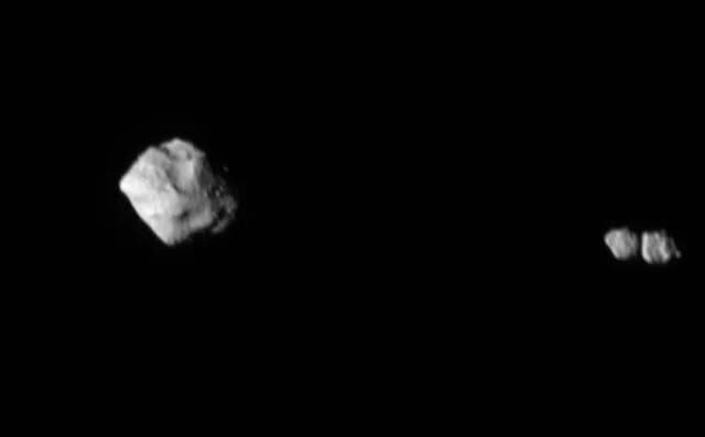 <p>This image shows the asteroid Dinkinesh and its satellite as seen by the Lucy Long-Range Reconnaissance Imager (L’LORRI) as NASA’s Lucy Spacecraft departed the system</p>